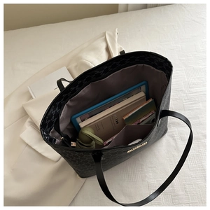 Interior view of large tote bag showing ample space for tablets, books and essentials