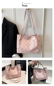Pink tote bag with rabbit print and metal chain strap shown from multiple angles