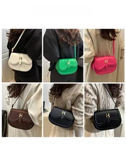 Various colors of the stylish saddle bag with metallic H buckle on fashion models