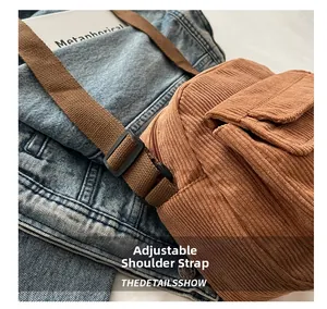 Detailed view of the brown corduroy crossbody bag with adjustable shoulder strap and flap pocket