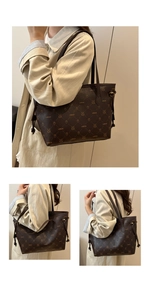 Macro view of textured brown leather tote bag with monogram pattern and gold drawstring hardware