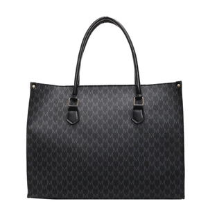 Chic black tote bag with repetitive M pattern and gold hardware on white background