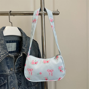 Light blue floral underarm bag with pink rose and bow prints for women's daily casual use