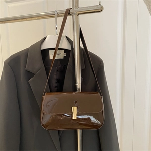 Classic dark brown patent leather shoulder bag with gold metal buckle for women
