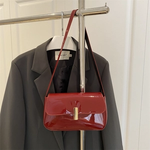 Chic red patent leather shoulder bag with gold metal buckle and vintage square design