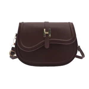 Minimalist dark brown saddle shoulder bag with golden H metal buckle in smooth leather
