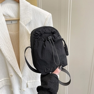 Minimalist black nylon drawstring crossbody mobile phone bag with logo embroidery