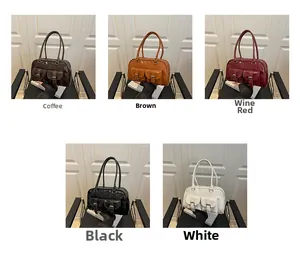 Detail view of bowling bags in five colors with front buckle pockets and glossy finish