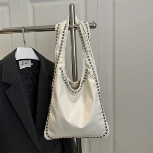 Cream white faux leather tote with silver rivets and soft pleated design for women