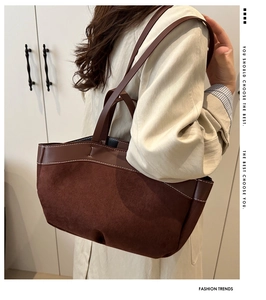 Brown suede patchwork tote bag with contrast stitching and slim leather straps