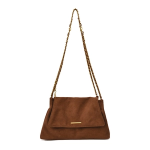 Minimalist brown suede tote bag with golden chain strap and magnetic flap closure