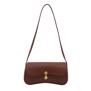 Brown leather underarm bag with gold U-shaped buckle and elegant curved bottom design