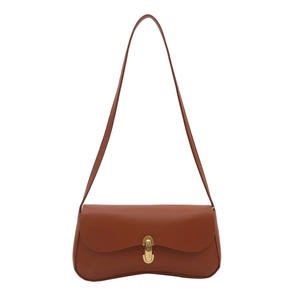 Caramel brown leather baguette shoulder bag with elegant oval golden metal lock