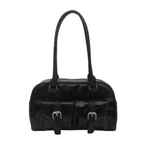 Black glossy patent leather bowling bag with silver buckle pockets and long shoulder straps