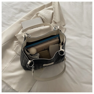 Interior view showing the large storage capacity of this checkered tote bag for essentials