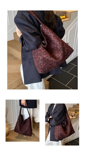 Macro view of leopard print texture and high-quality fabric on a large tote bucket bag