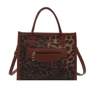 Sac fourre-tout à imprimé léopard avec bordure en cuir marron et fermeture éclair dorée