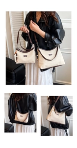 Detail view of retro canvas underarm bags in two sizes with brown leather trim and beads