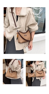 Detailed views of vintage large tote with ethnic beads and canvas leather stitching