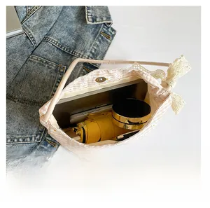 Interior view showing large capacity and magnetic buckle of floral canvas tote bag