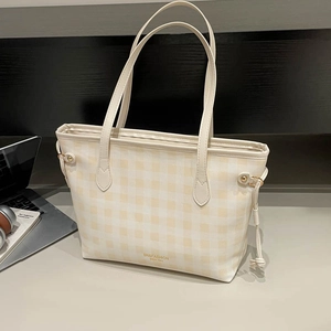 Classic yellow and white checkered tote bag with slim shoulder straps for daily commuting