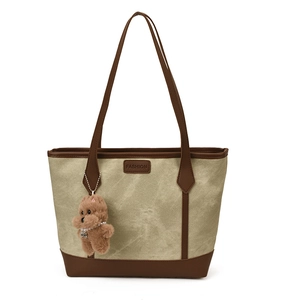 Large khaki canvas tote bag with brown leather trim and cute bear keychain charm
