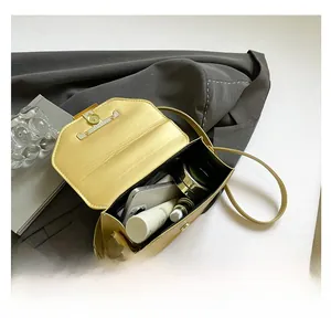 Top view of yellow leather crossbody bag showing spacious interior for daily essentials