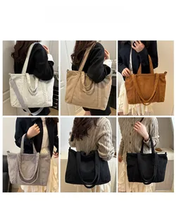 Detail view of large corduroy tote bag in multiple colors with adjustable straps