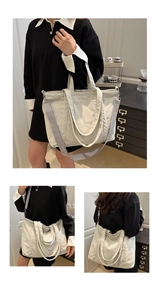 Detail of cream corduroy tote bag showing various carrying styles and adjustable strap