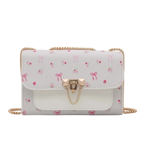 Chic cream leather mini crossbody bag with pink floral patterns and gold chain strap