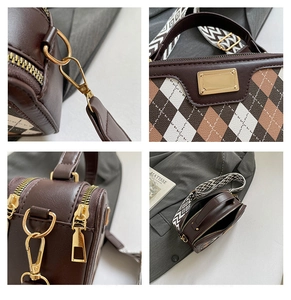 Detailed view of color-block quilted handbag with gold hardware and woven strap