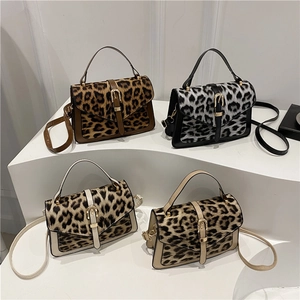 Fashionable leopard print small square bags in brown, black, and beige with gold buckles