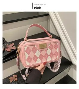 Pink argyle pattern PU leather crossbody bag with wide shoulder strap and gold accents