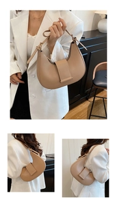 Detail of khaki PU leather hobo bag with metal buckle and adjustable shoulder strap