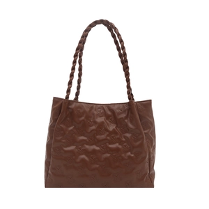 Brown retro tote bag with embossed bear pattern and braided handles on white background