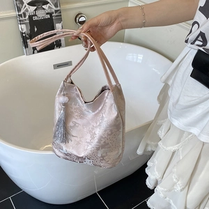 Elegant pink jacquard bucket bag with landscape print and silver tassel for women