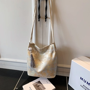 Hobo shoulder bag with traditional Chinese embroidery and golden landscape pattern