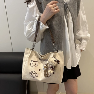 Chic beige canvas tote bag with cute cat prints and stylish leather chain straps