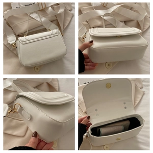 Détails du sac selle blanc avec fermoir magnétique doré et large bandoulière