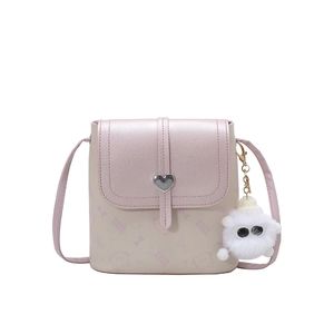 Pink and beige crossbody bag with heart lock and cute plush charm on white background