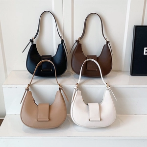 Minimalist half-moon hobo shoulder bags in black, brown, khaki, and cream leather colors