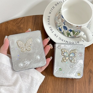 Luxe Samsung Z Flip case with pearl bow and colorful rhinestone butterfly design