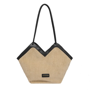 Beige corduroy tote bag with black leather trim and V-shaped opening for women