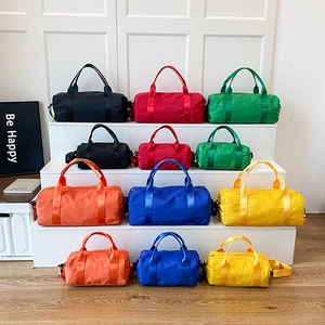 Versatile multi-color nylon fitness duffel bags in medium and large sizes