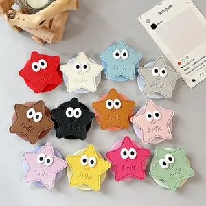 Support De Téléphone En Forme D'étoile Cuir PU Sourire Yeux De Dessin Animé Magnétique Pliable Pour Femmes Filles
