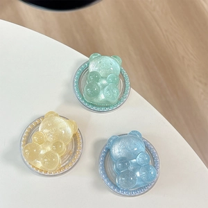 Glittery resin bear phone grip set with pearl base in mint, yellow, and blue colors