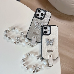 Luxe pleated leather iPhone case with rhinestone butterfly and beaded hand strap