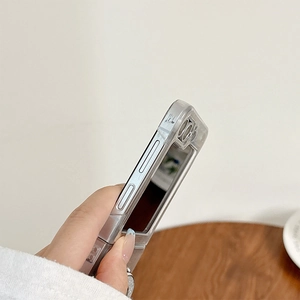 Macro view of clear folding phone case showing precise cutouts and branded top edge