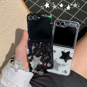 Detail of glitter star foldable phone case with luxury beaded star charm strap