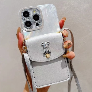 Detail of iPhone case with pearlescent finish, grey leather coin pouch and crossbody strap
